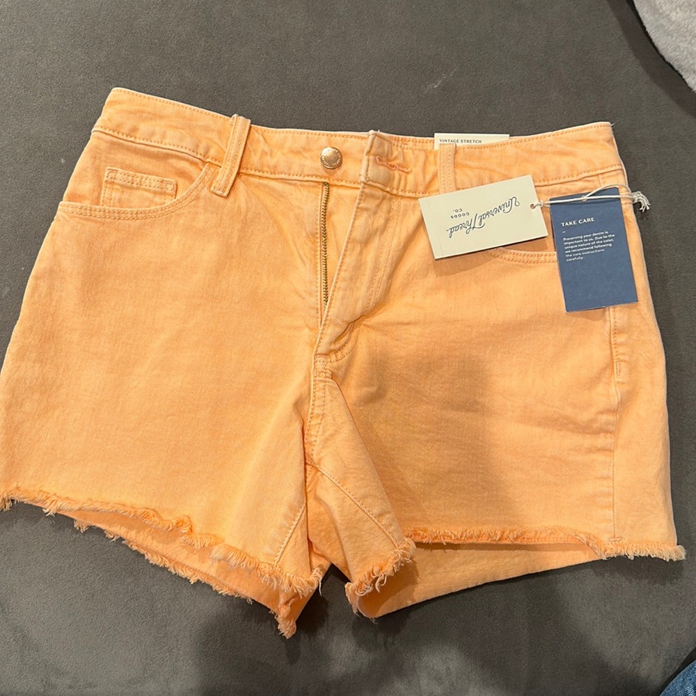 Orange denim shorts